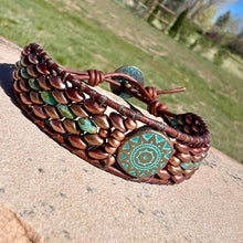 Load image into Gallery viewer, Wide copper/turquoise beaded bracelet with Sun focal bead
